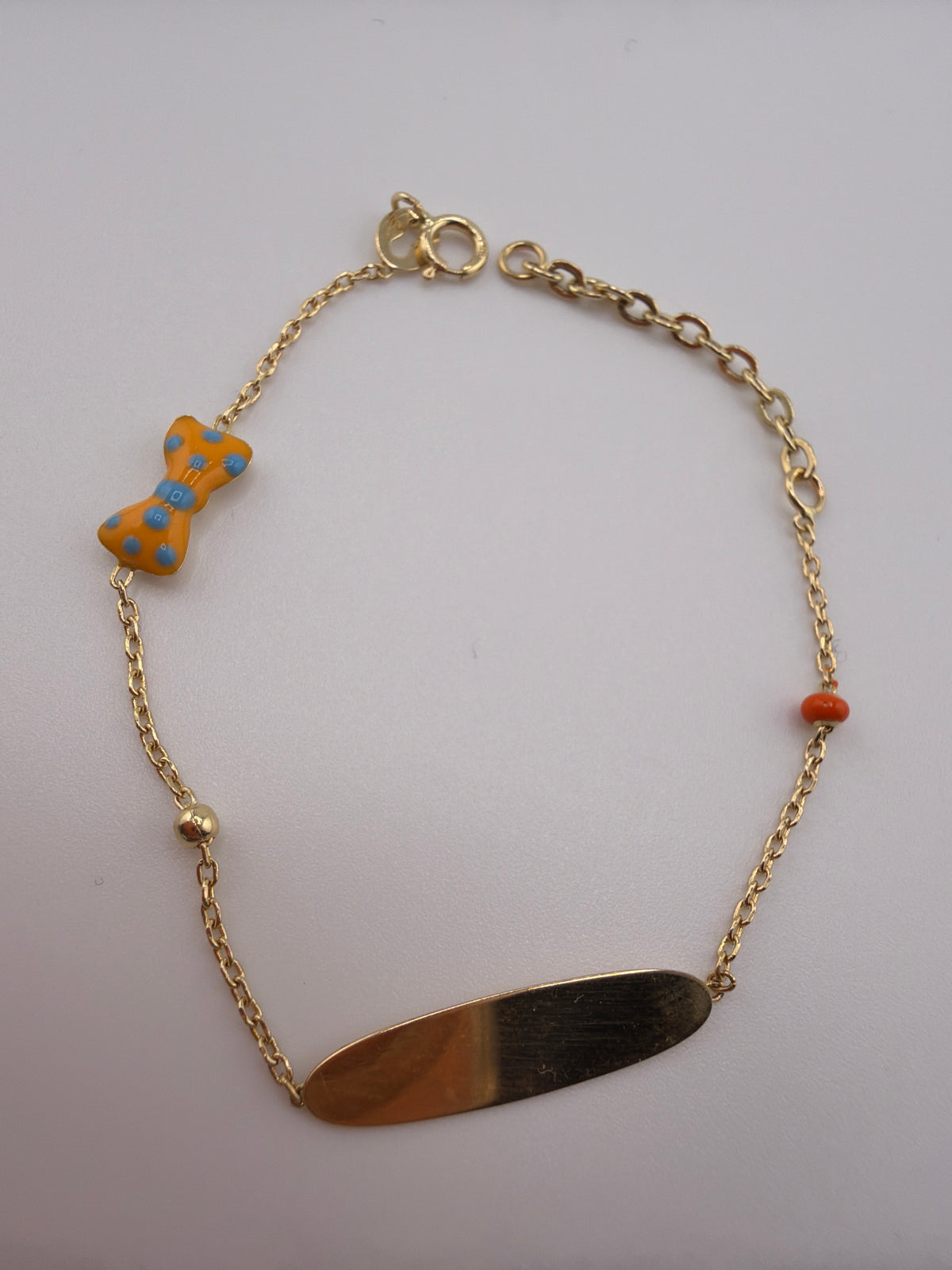 Bracelet Petit Nœud à pois pour bébé en or 18 carats
