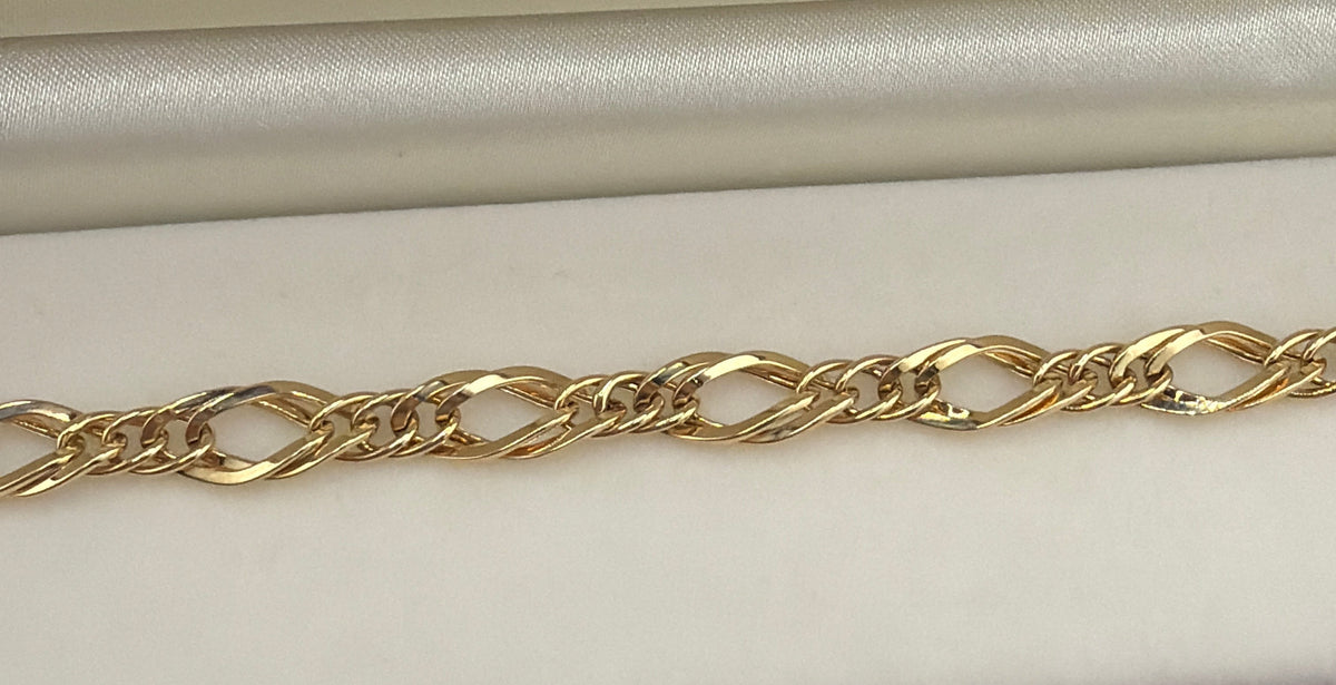 Bracelet à mailles alternées en or 18 carats. 4.22g