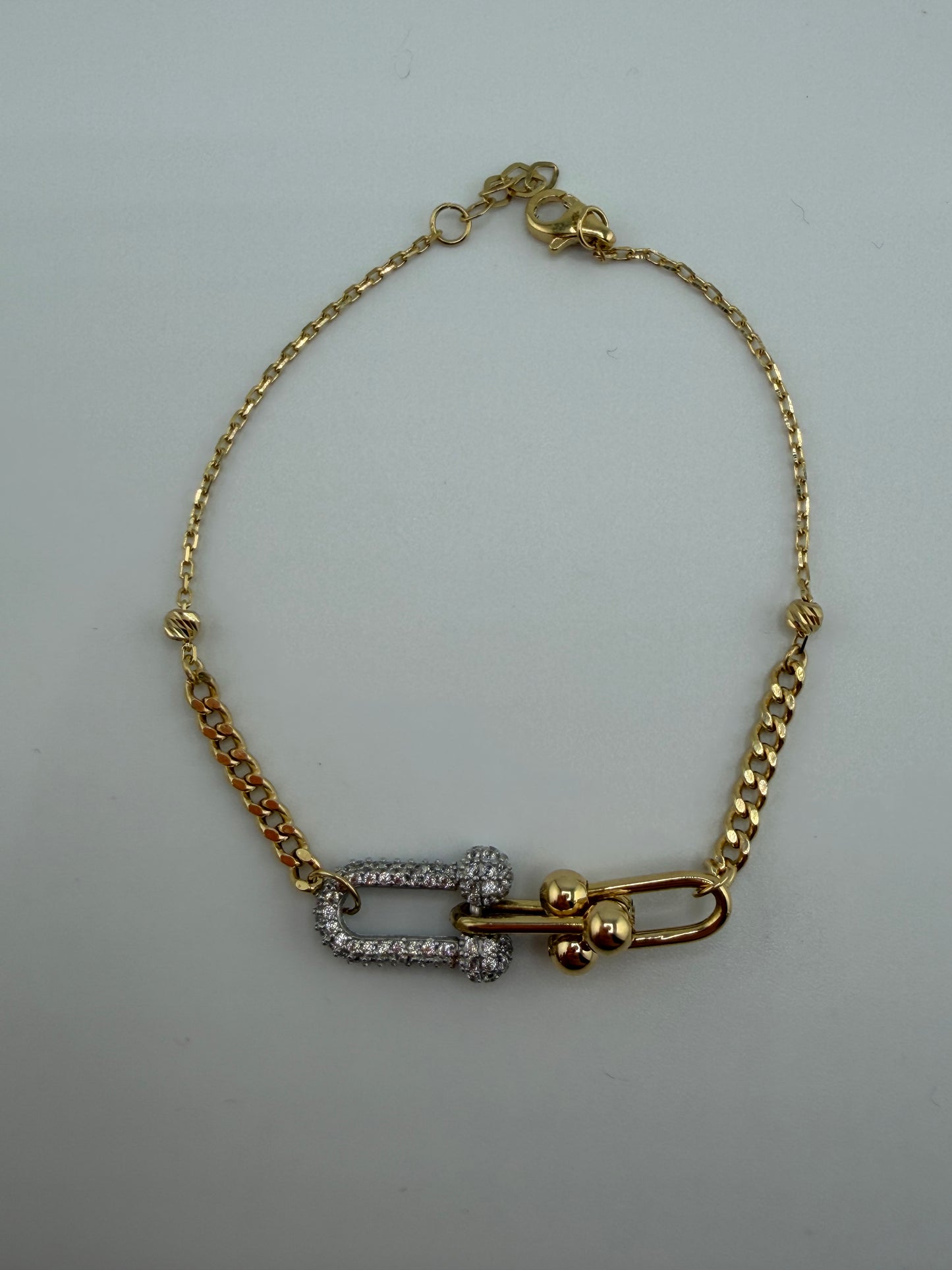 Bracelet style trombone bicolore en or 18 carats