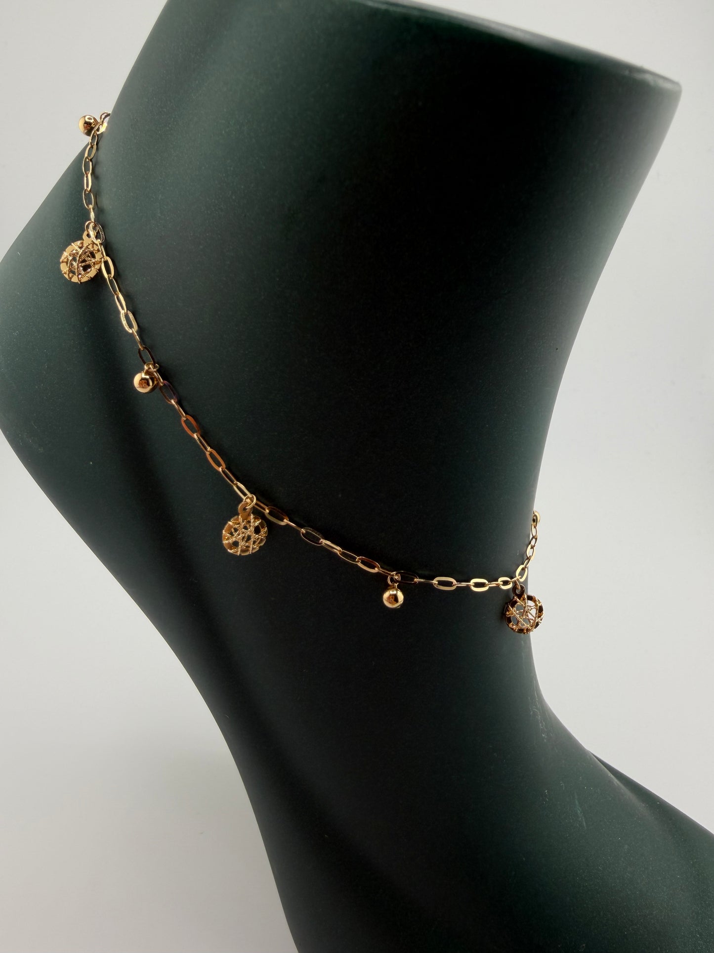 Bracelet de cheville à breloques en or 18 carats