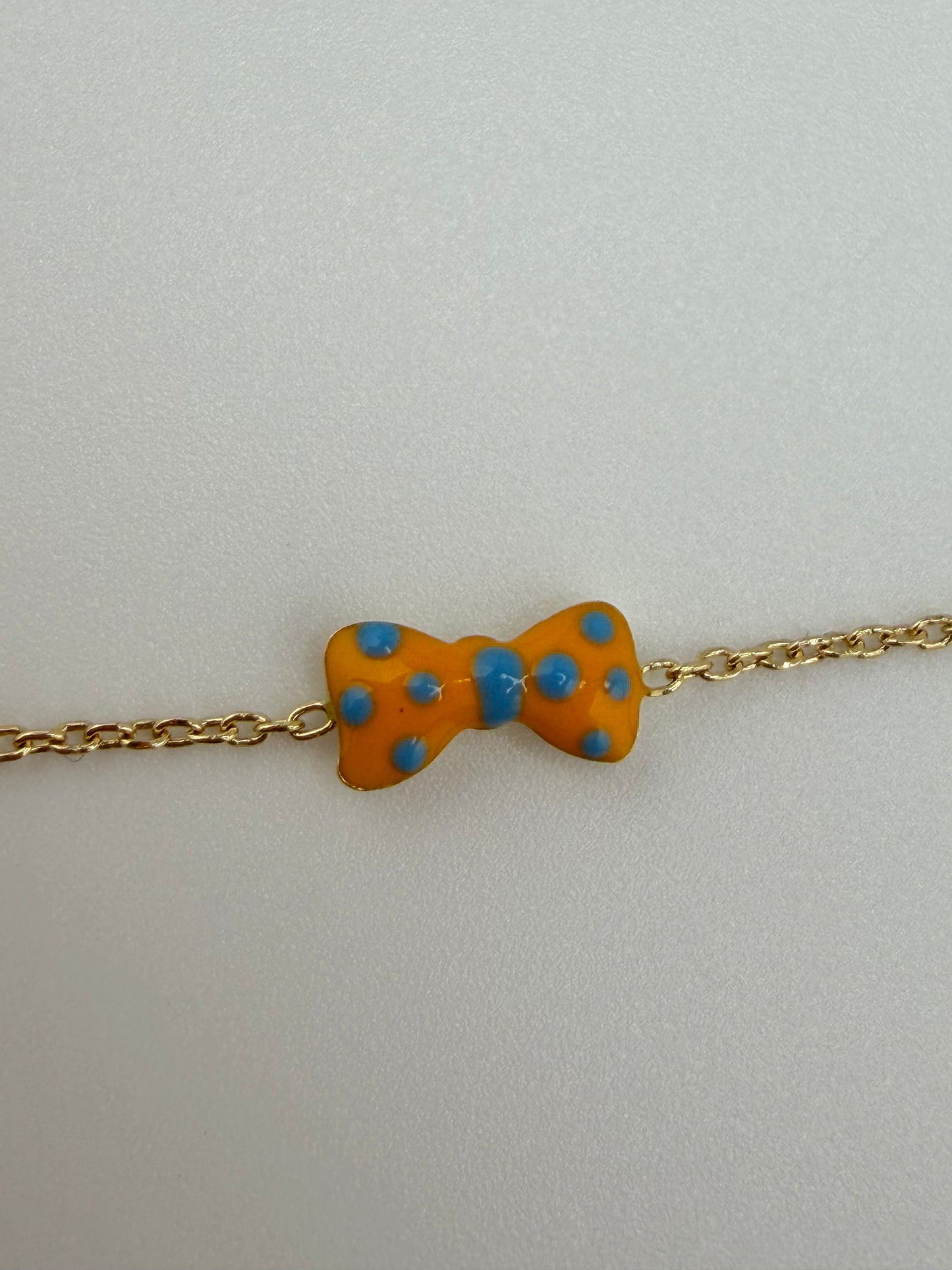 Bracelet Petit Nœud à pois pour bébé en or 18 carats