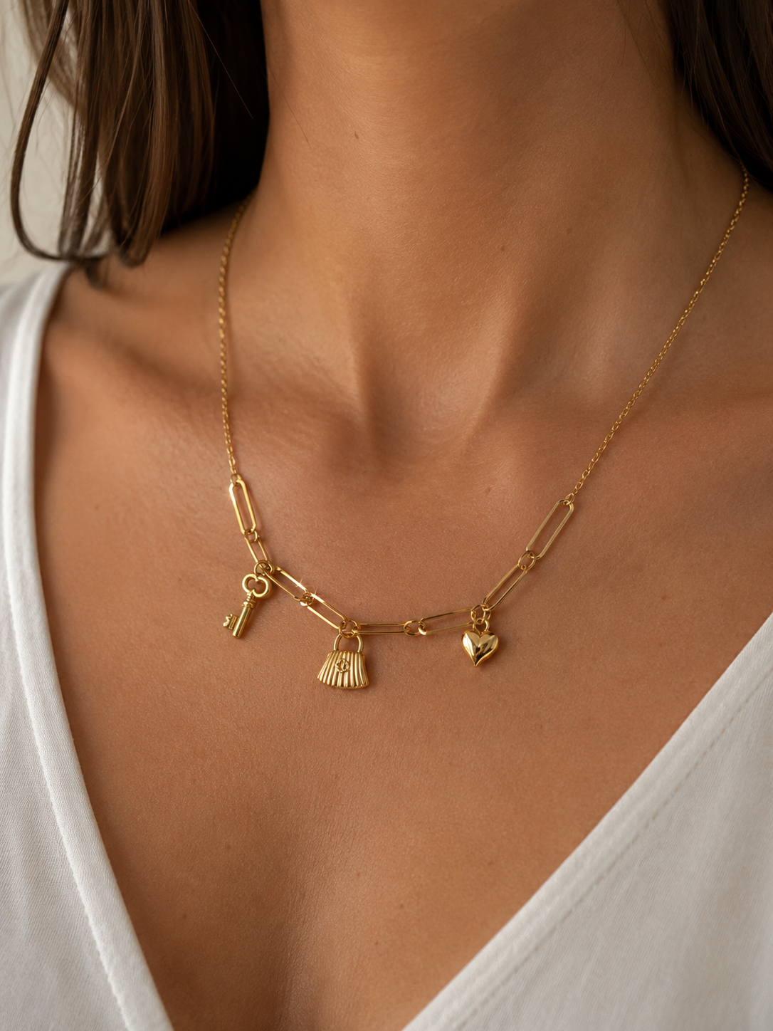 Collier avec charmes